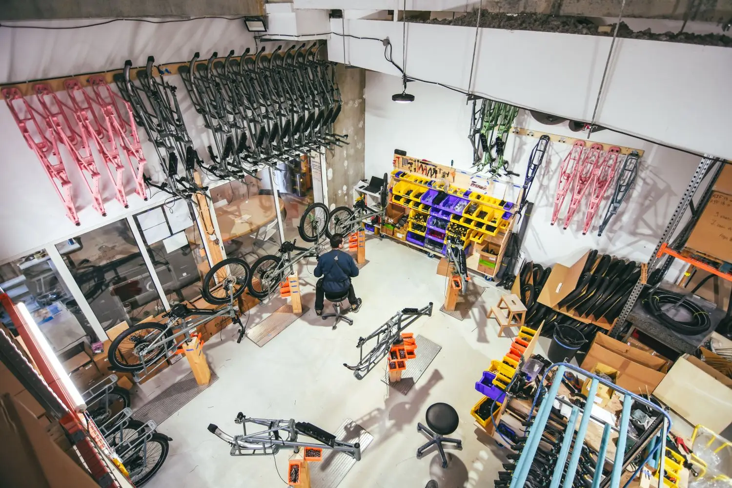 Wide view of a bicycle workshop with service benches